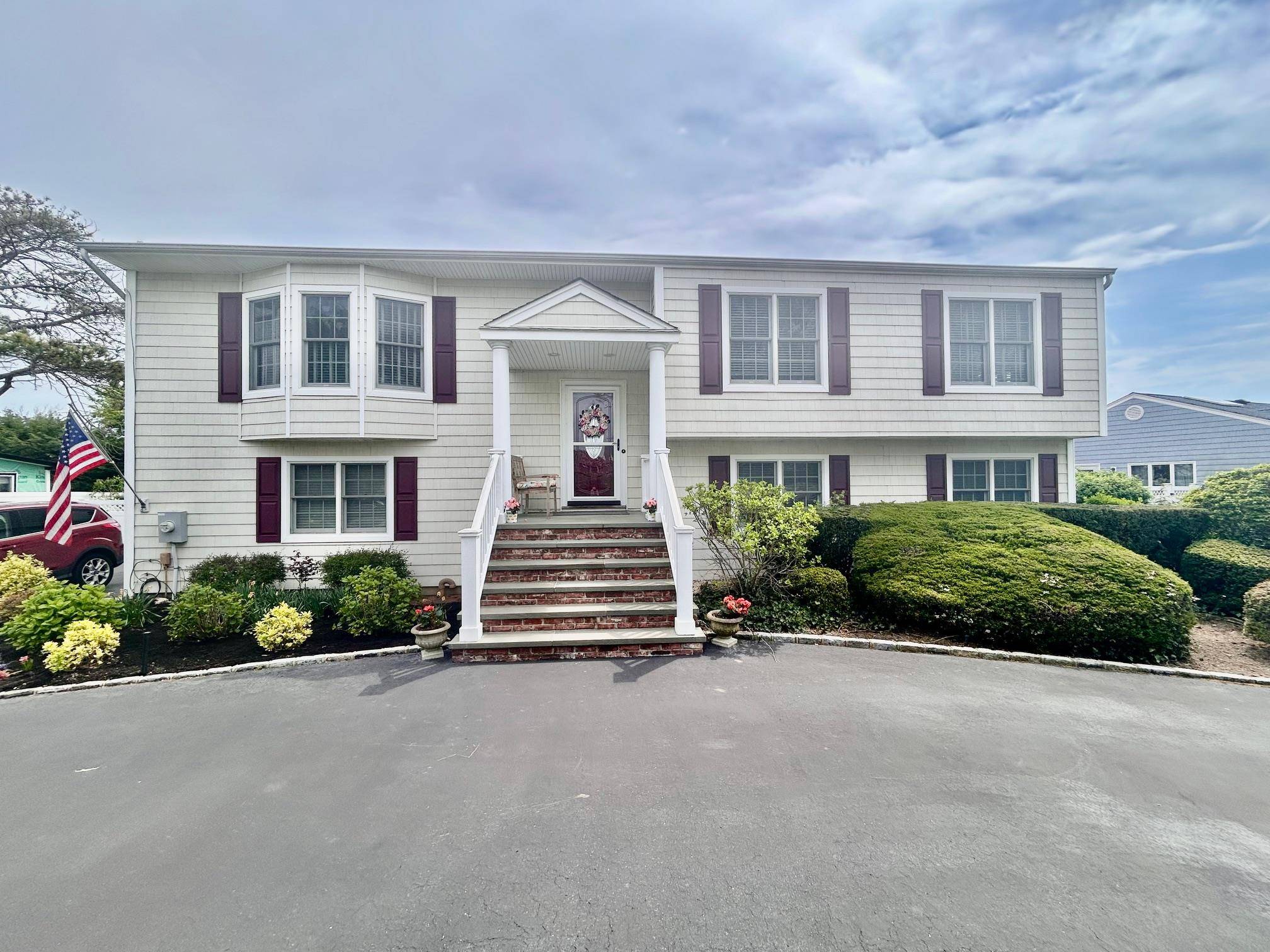 Pristine turn key large High Ranch in Copiague Harbor.