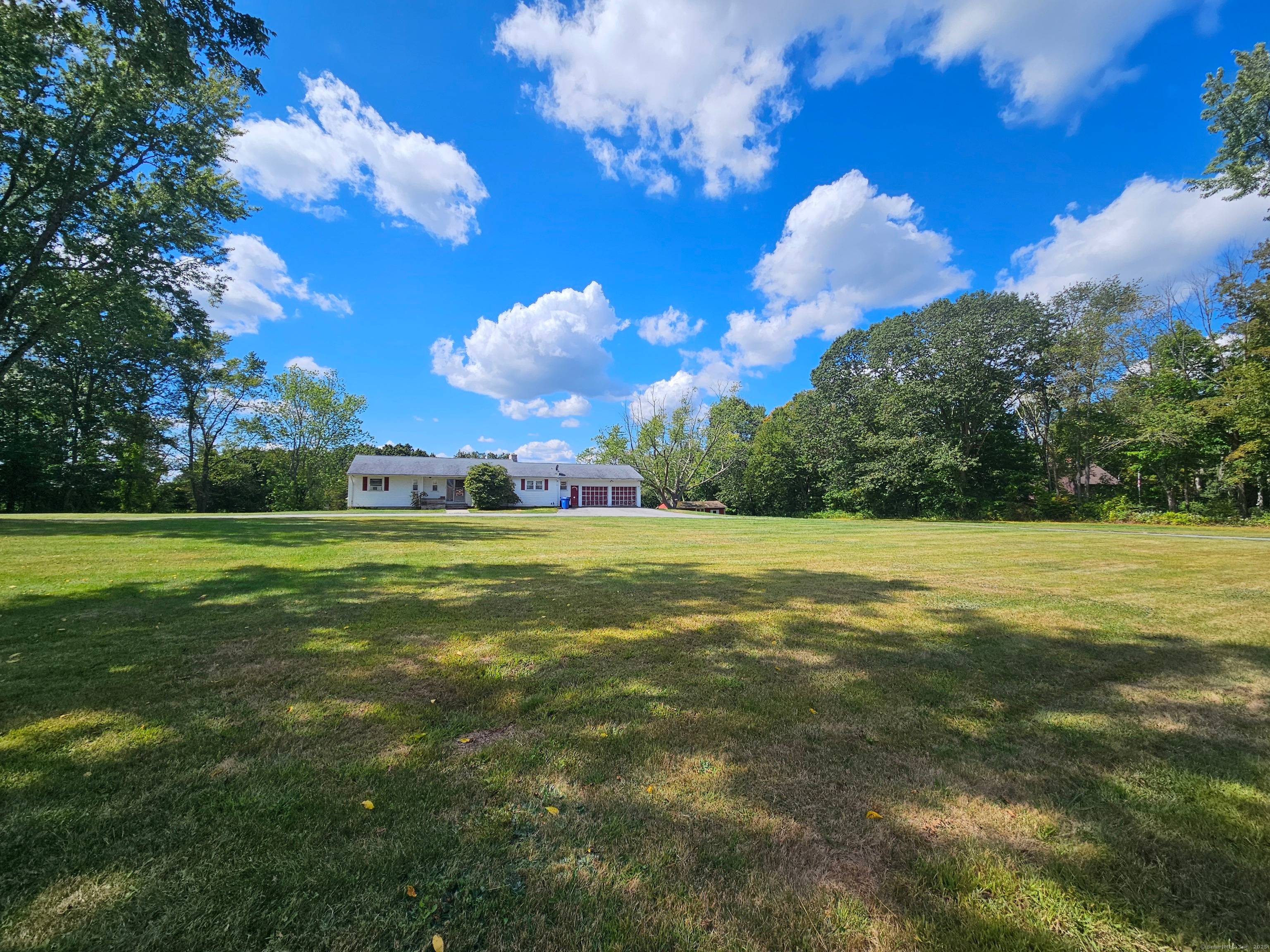 Killingly PRESTIGE LOCATION with 38 Acres on NORTH ROAD with BREATHTAKING VIEWS from this AMAZING property consisting of 38 Acres of land with a home, a POND and a shed.