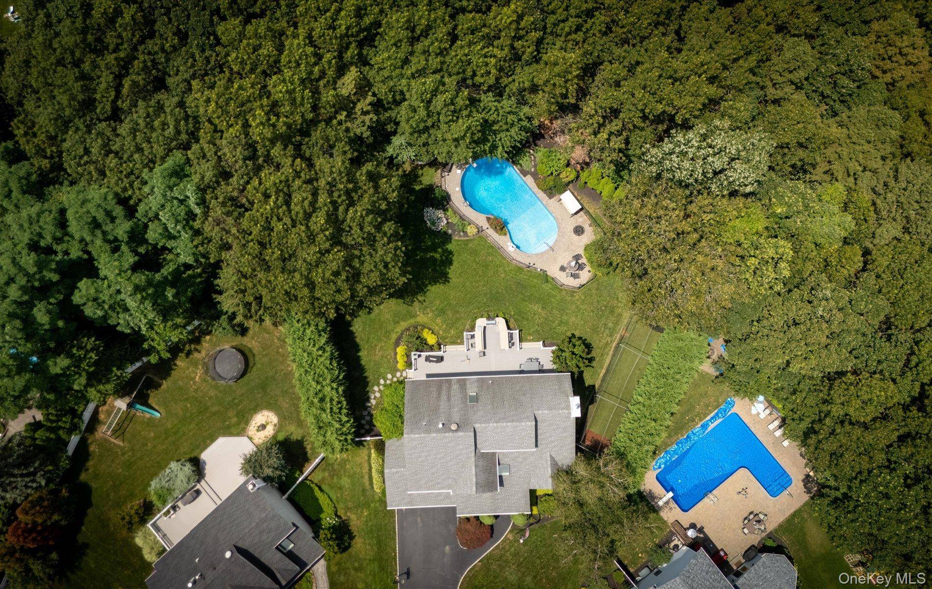 Tucked away on a Cul De Sac, One of a Kind 4 Bedroom Colonial with a Full Basement in Country Estates.