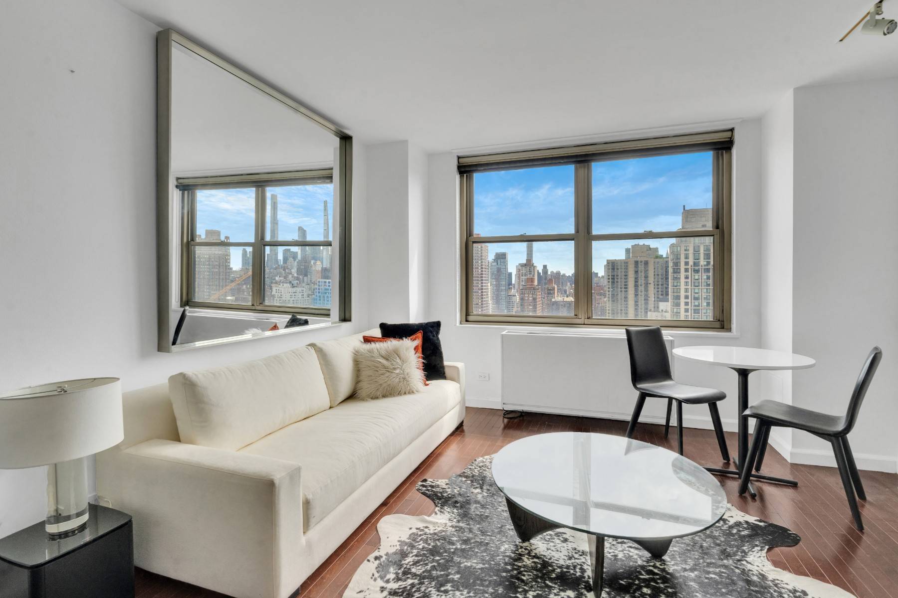 Imagine waking up to breathtaking views of the Manhattan skyline from the 28th floor of Continental Towers, the Upper East Side's most coveted condominium.