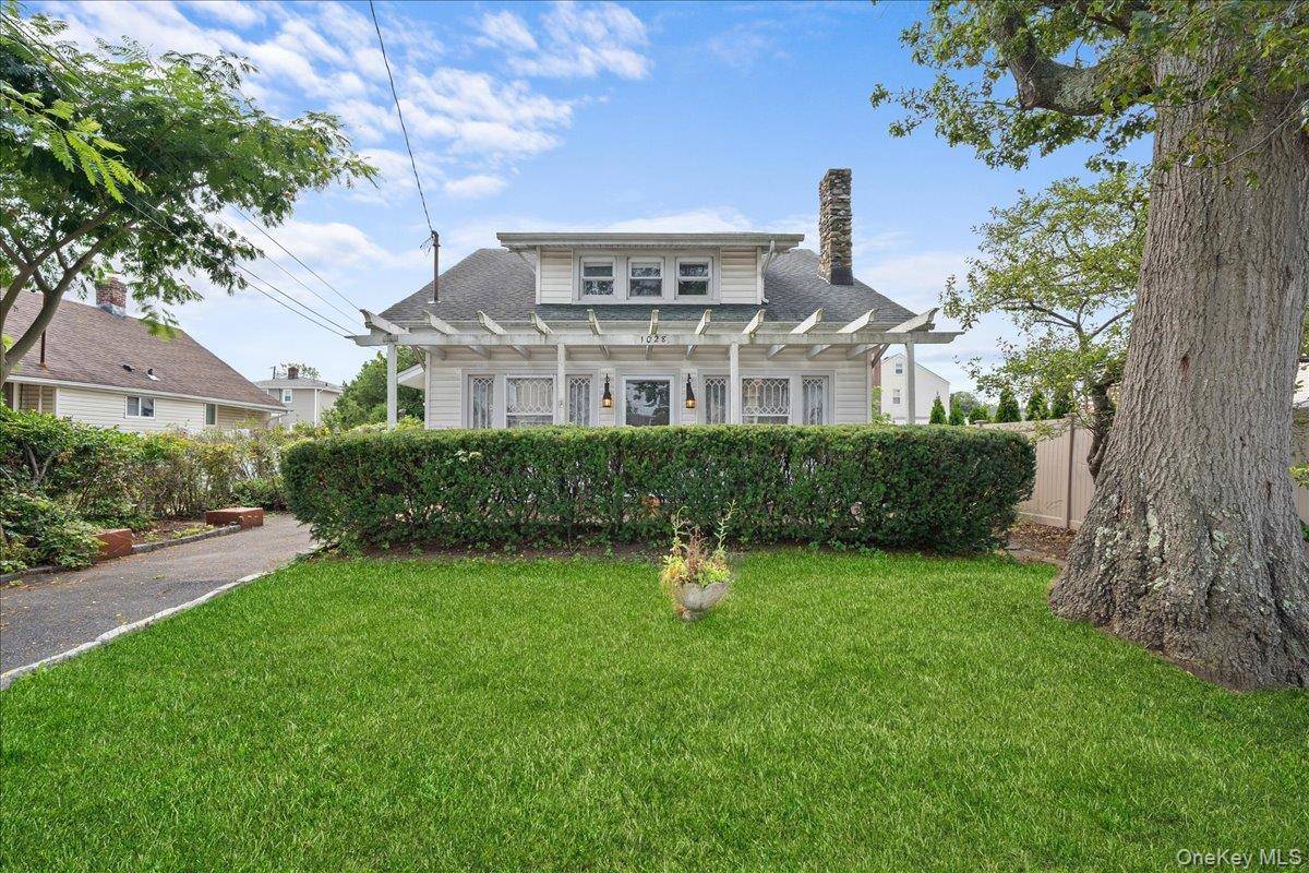 Welcome to this beautifully preserved 1918 Craftsman Colonial, lovingly maintained by the same family for almost 60 years.