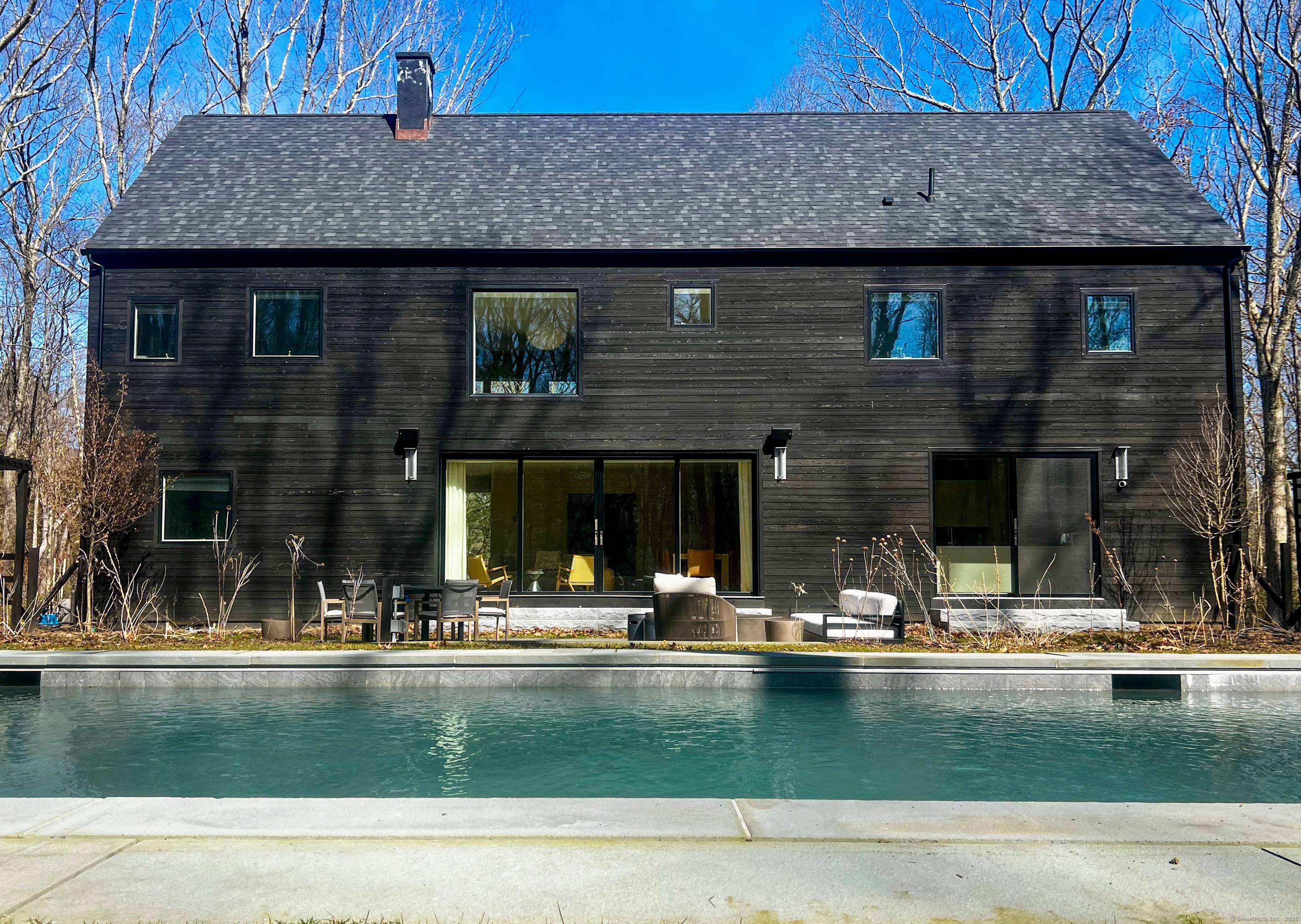 Available August 2025 Just moments from the picturesque town of Salisbury, this private summer retreat is a masterpiece of contemporary design by premier architect StoneFox.