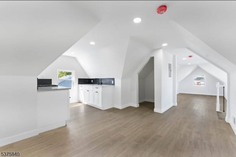 Welcome to 437 Bramhall Avenue ; a beautifully renovated four family Victorian gem sitting on an oversized double lot in Jersey City ?