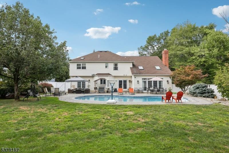 Welcome to your storybook colonial, tucked away on a quiet West Caldwell cul de sac.