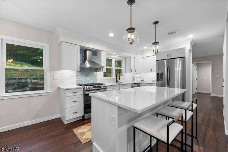 Beautiful Colonial located on a quiet cul de sac in the highly sought after Nestling Wood neighborhood of Long Valley.