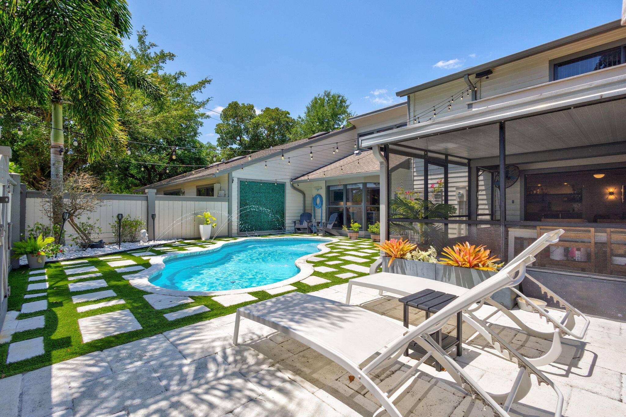 STUNNING, FULLY RENOVATED TOWNHOME WITH A PRIVATE POOL.