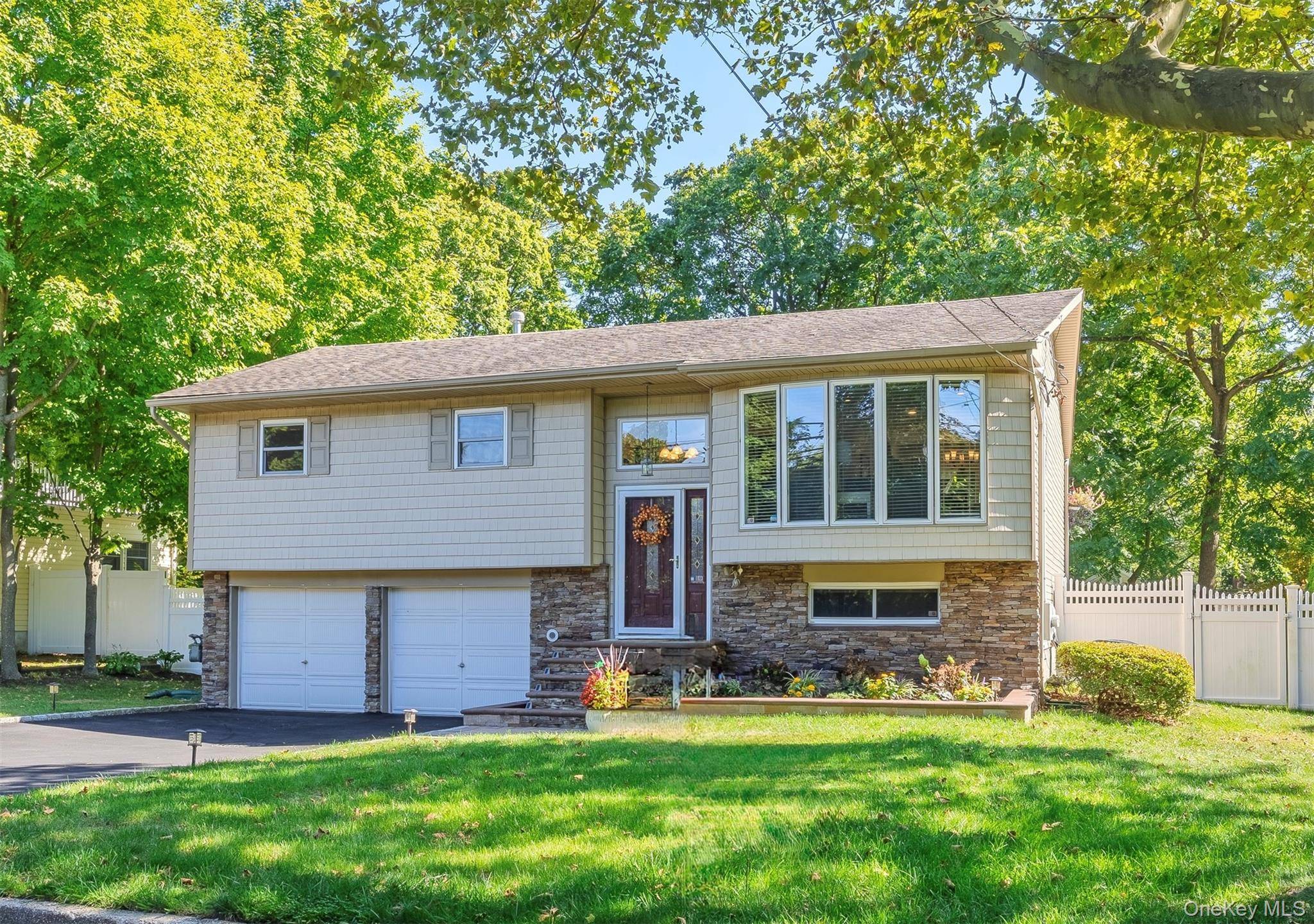 Stunning Hi Ranch Turnkey Home on Dead End Street Mother Daughter In Law Suite Potential.