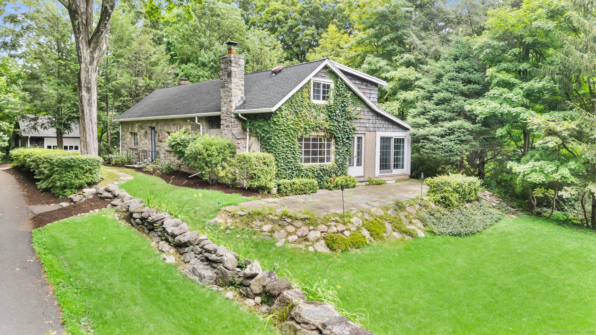 Storybook Charm Meets Modern Convenience in Lower Weston !