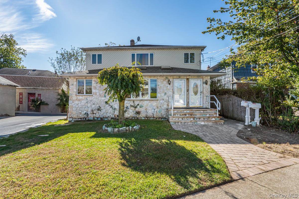 This duplex home boasts 11 bedrooms and 5 full bathrooms, offering ample storage space and plenty of room for entertainment.