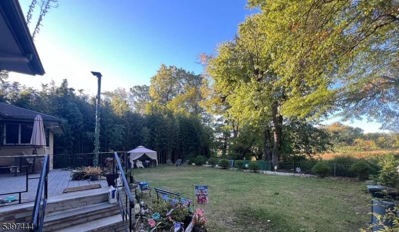 8 bedrooms, 4 full bathrooms Bi level single family home with two independent living areas 2 attached garages private parking