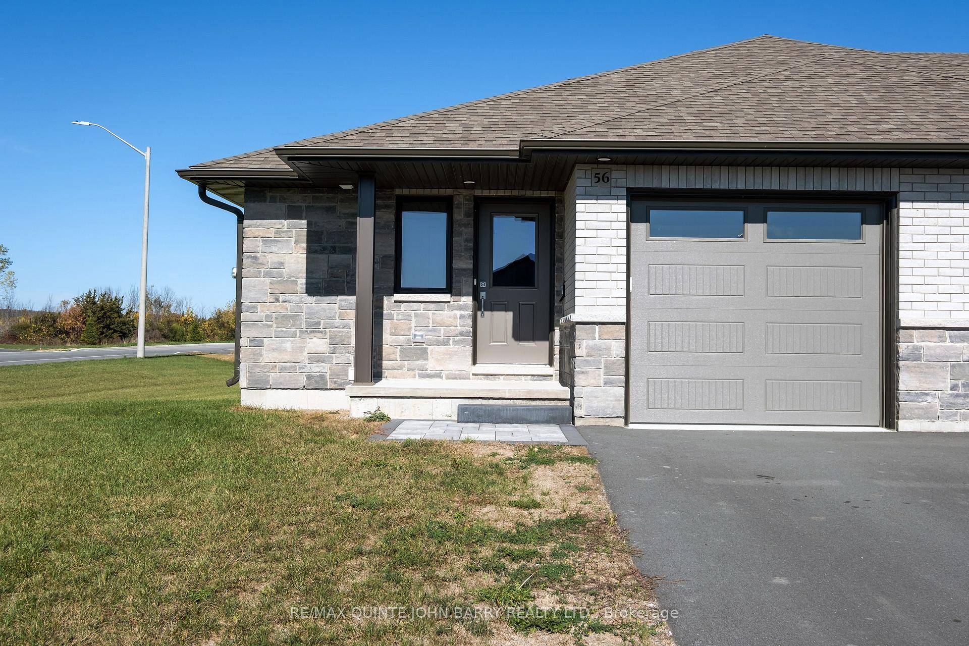 Immediate Possession ! This new Klemencic Homes townhome offers 1, 023 sq ft of living space and has charming curb appeal.