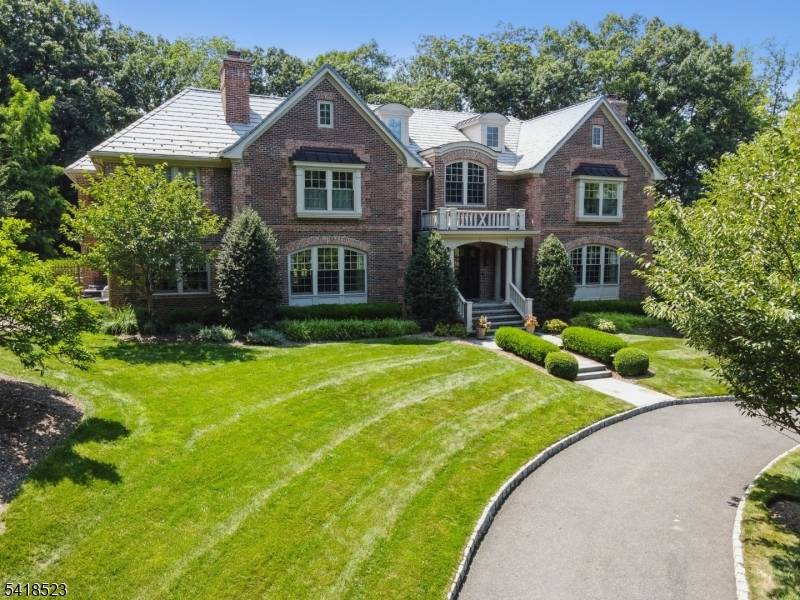 Experience the pinnacle of luxury living in this magnificent, stately 9, 000 sq ft All Brick Colonial w Davinci Slate roof on.