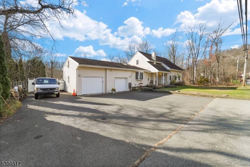 Custom expanded ranch. It's a spacious three bedroom, possibly six bedroom, custom home on a large level lot featuring a spectacular eat in kitchen, two bedrooms on the first floor.