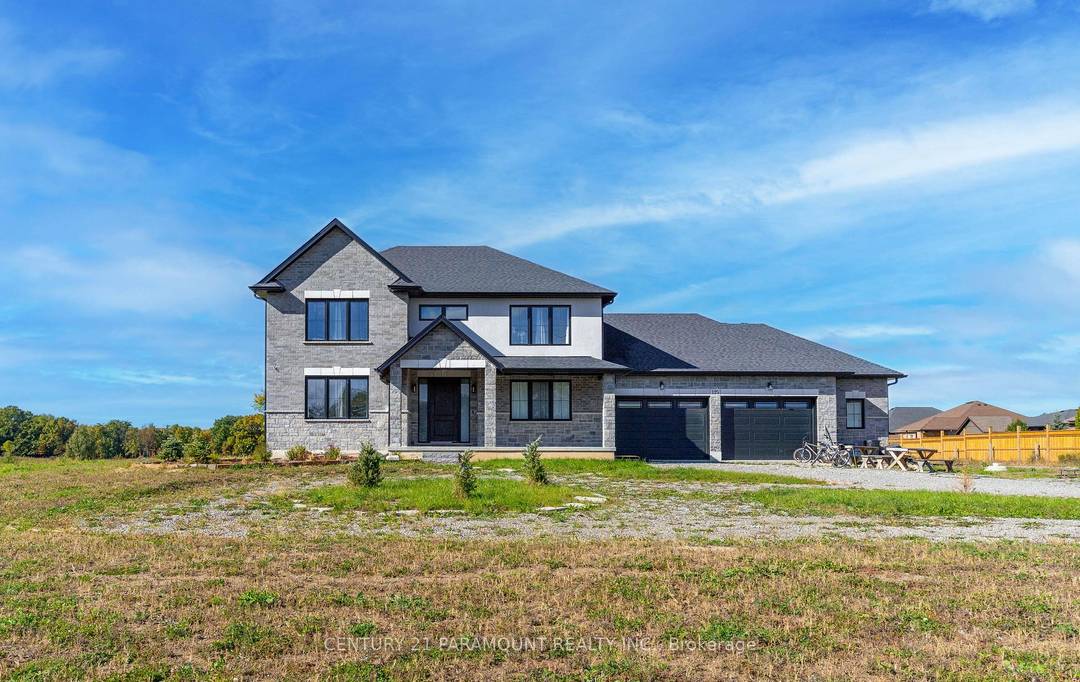 Stunning Custom built house situated on approximately 26 acres of land, completed in 2023.