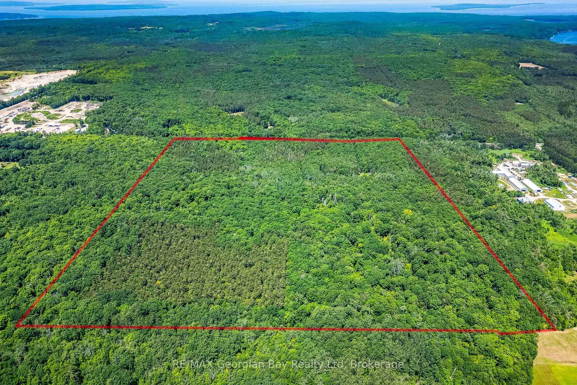 First time offered for sale this rare and expansive 100 acre parcel in Tiny Township opens up incredible opportunities to fulfill your dreams.