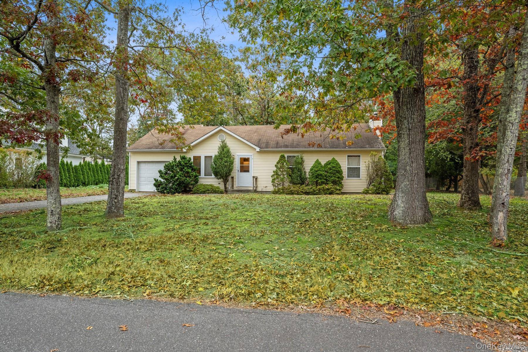 LIGHT FILLED RANCH SOUTH OF THE HIGHWAY IN EAST QUOQUE !