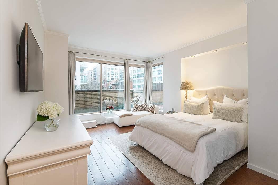 This elegant, renovated studio offers a rare blend of modern luxury and full service condominium living.