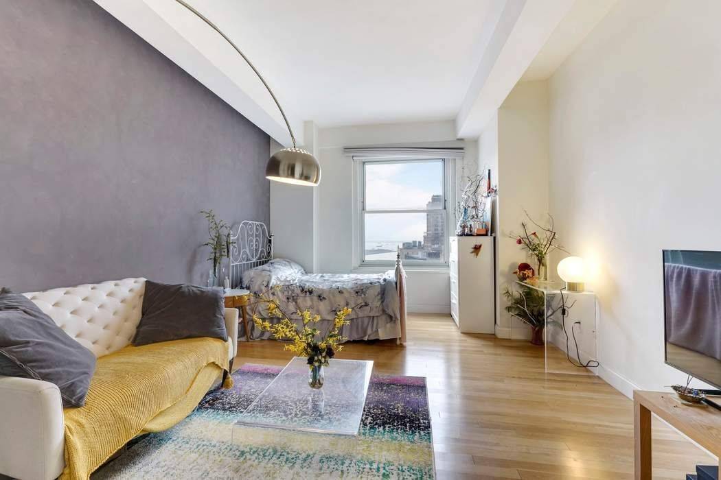 Apartment 2503 offers panoramic views of the Hudson River and Battery Park.