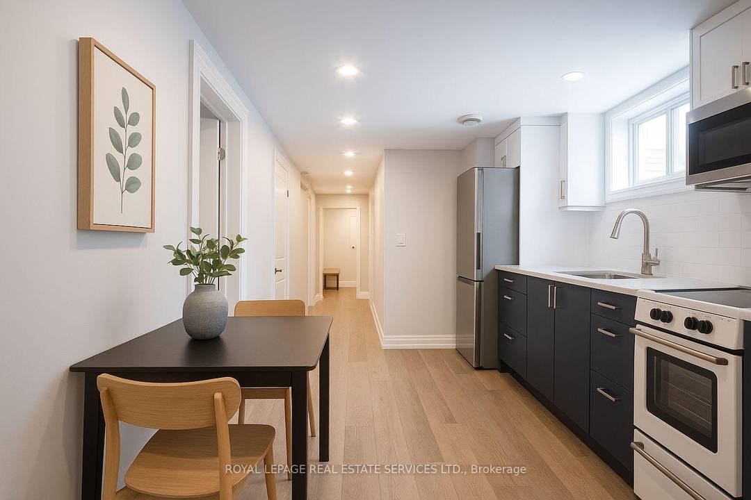 Beautifully RENOVATED, SUPER QUIET lower level unit, HEATED FLOORS and HIGH CEILINGS offers a bright, warm, welcoming atmosphere with elevated finishes, energy effecient and sound proofing throughout.