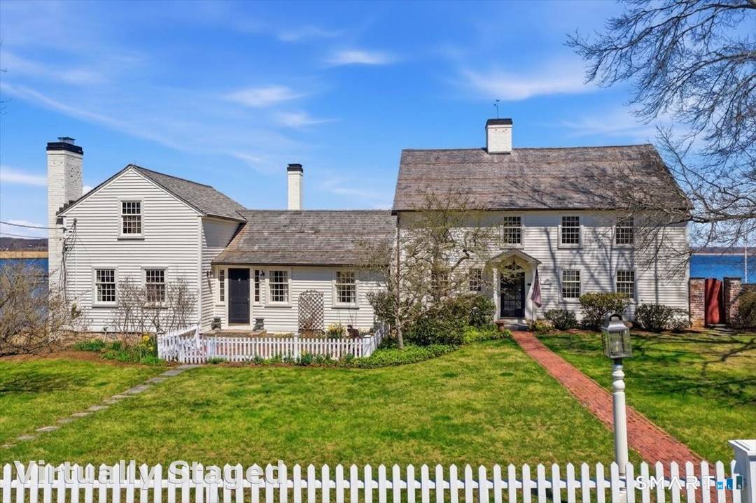 An exceptional offering in the heart of North Cove, this storied estate presents a rare convergence of history, scale, and coastal prestige in Old Saybrook.