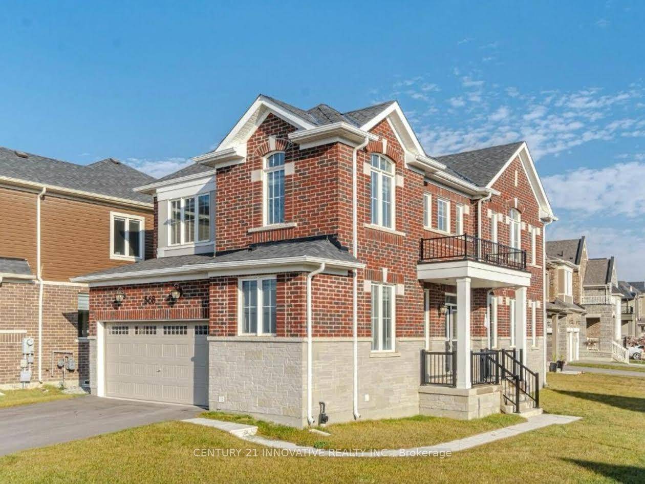 Welcome to this stunning 4 bedroom corner home in one of Milton's most desirable neighborhoods.