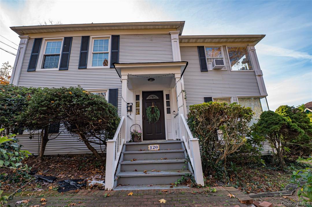 An authentic 1860 colonial preserved and updated with Port Jefferson Village Harbor views.