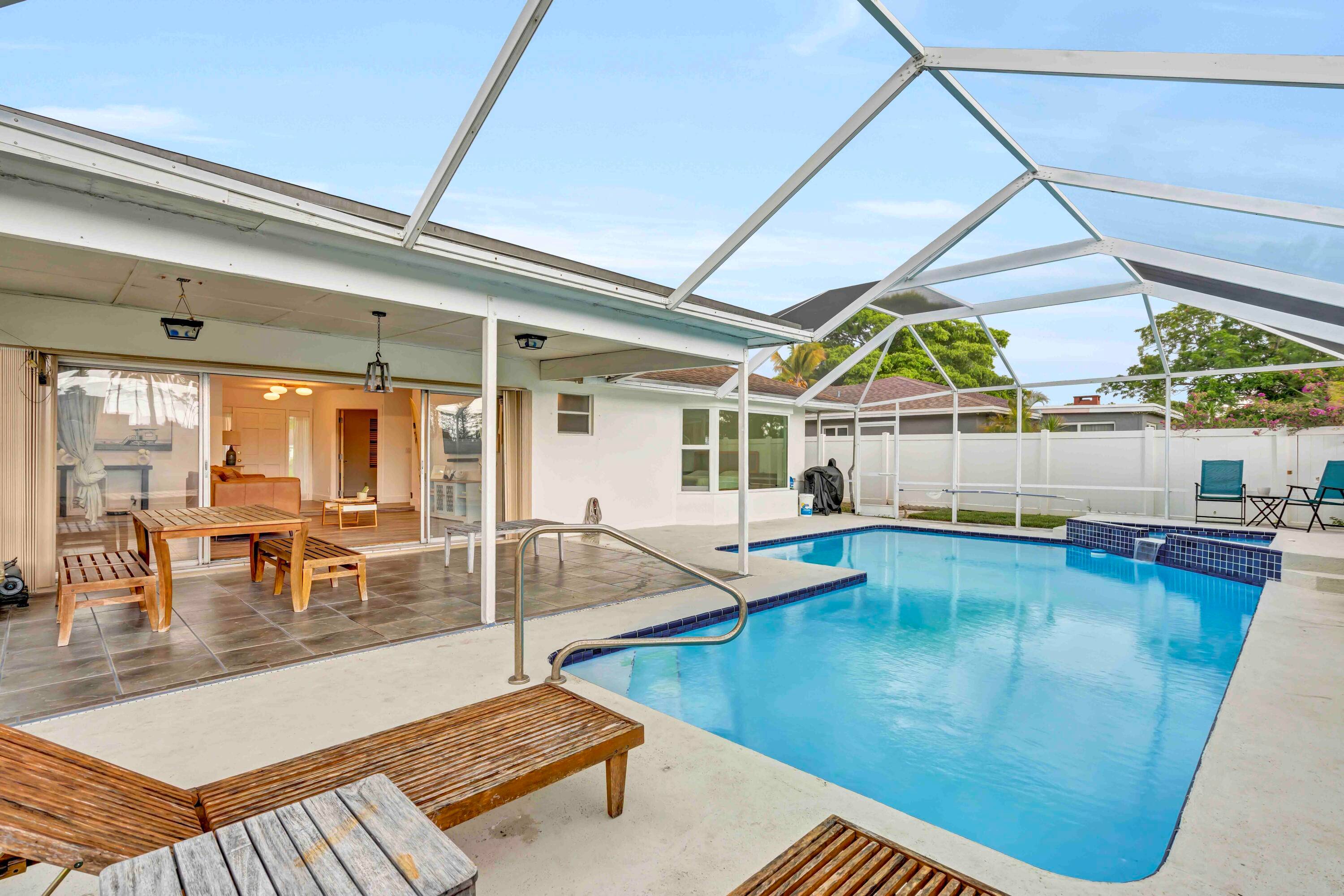 Light and bright 3 bedroom, 2 bath single family ranch just 10 minutes from Singer Island Beach.