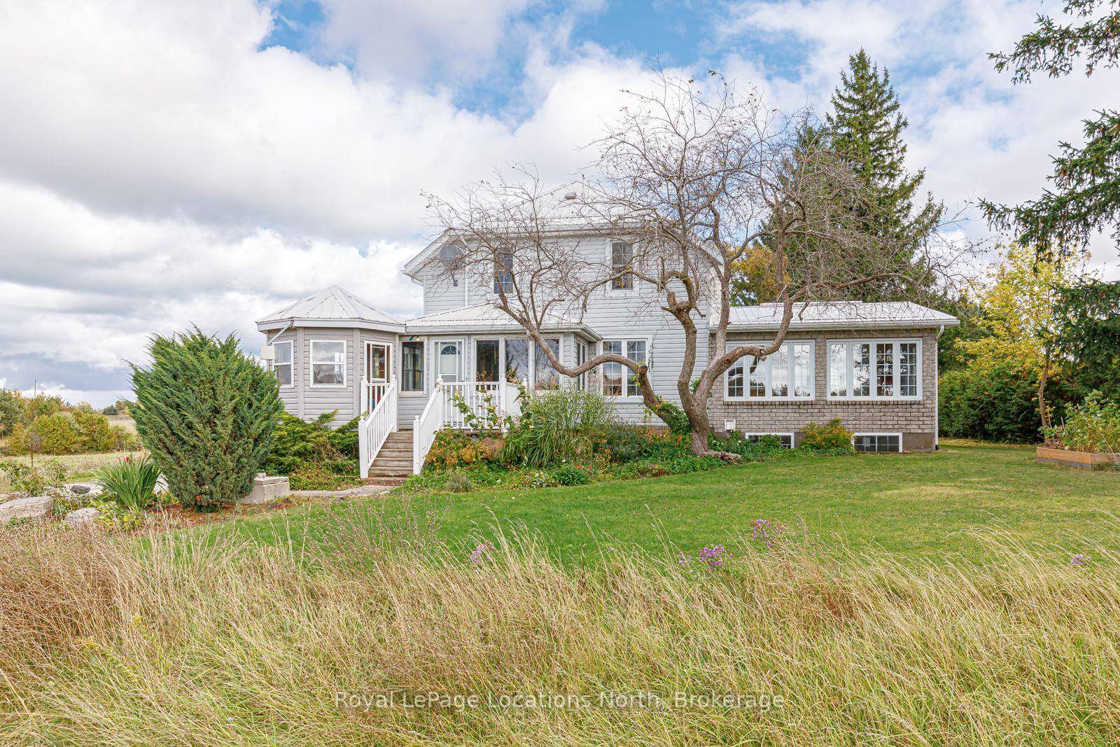 Welcome to your expansive country retreat, where space, comfort, and rustic charm blend seamlessly to create the perfect haven for a large family.