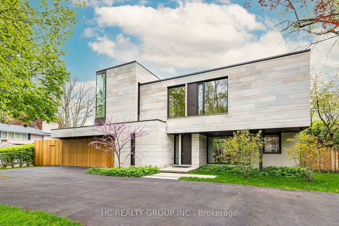 Nestled in the highly sought after Eastlake neighborhood of Oakville, this stunning contemporary home is a masterpiece of design.