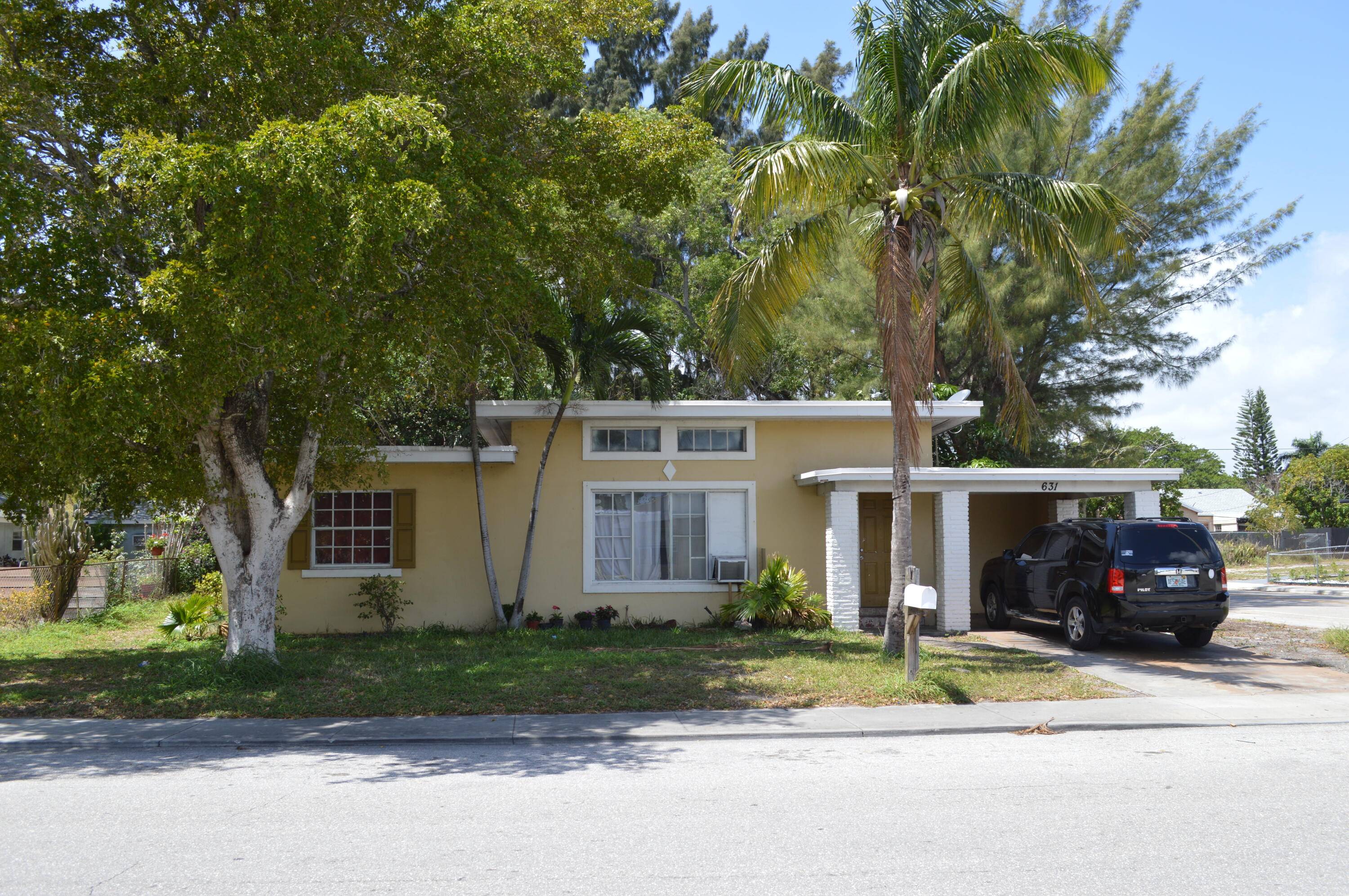 LARGE DOUBLE CORNER LOT, POSSIBLE TO ADD BUILDING.