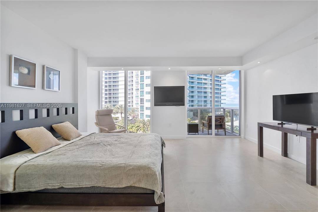10275 Collins Avenue 605 Experience the epitome of coastal elegance in this bright, 6th floor residence at the prestigious Harbour House in Bal Harbour.
