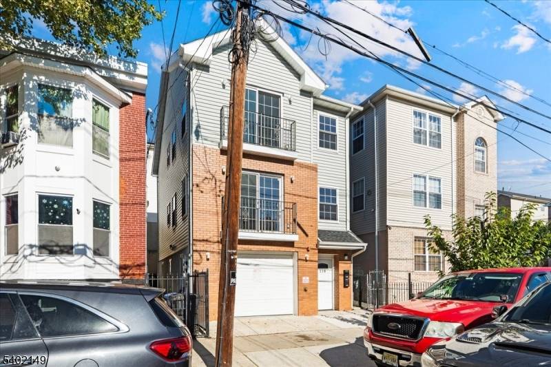 Exceptional new construction two family home completed in 2022, ideally located in Newark's North Ward, just off Broadway and between Chester Delevan Avenues, near the Belleville border.