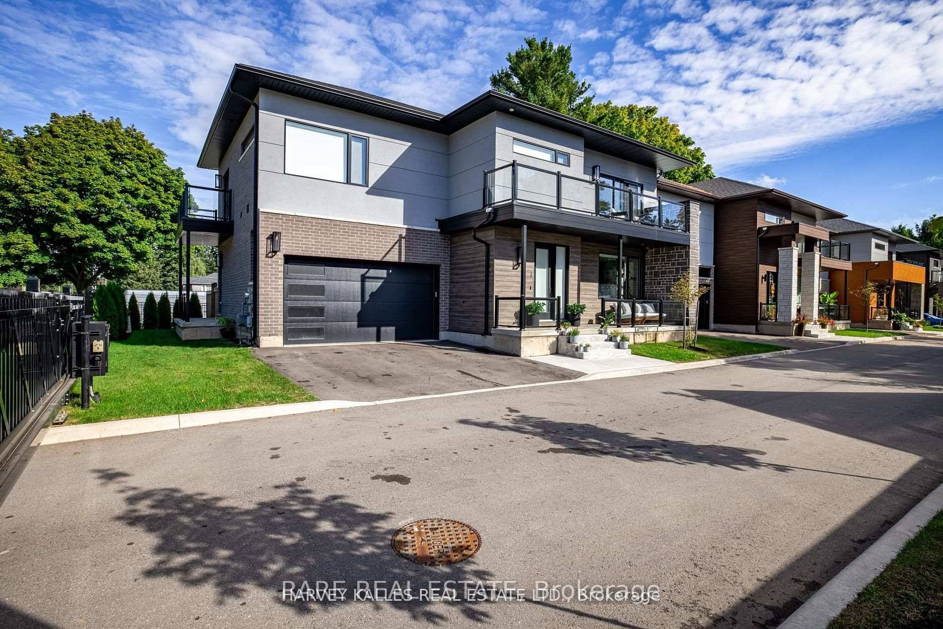 Welcome to Unit 1 at The Reserves Residences on Fiddlers Green an exclusive gated enclave of only 5 private homes in Ancaster.