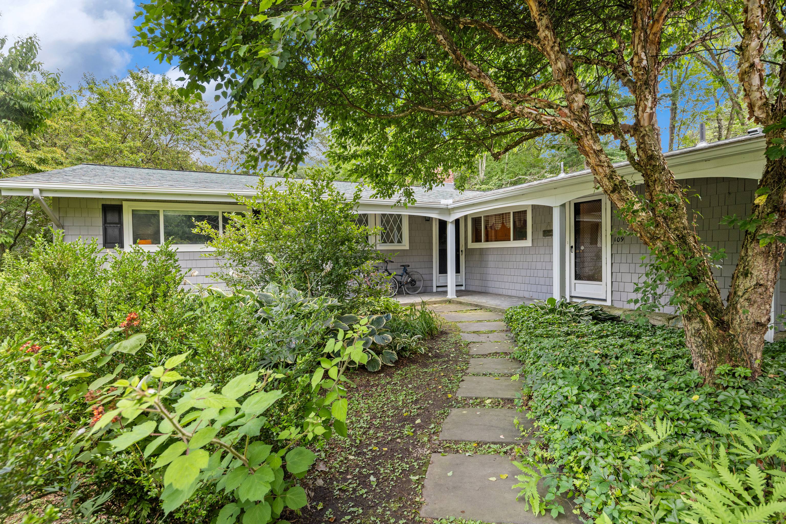 Welcome to 109 Country Club Road, a spacious and beautifully maintained ranch set on a generous.