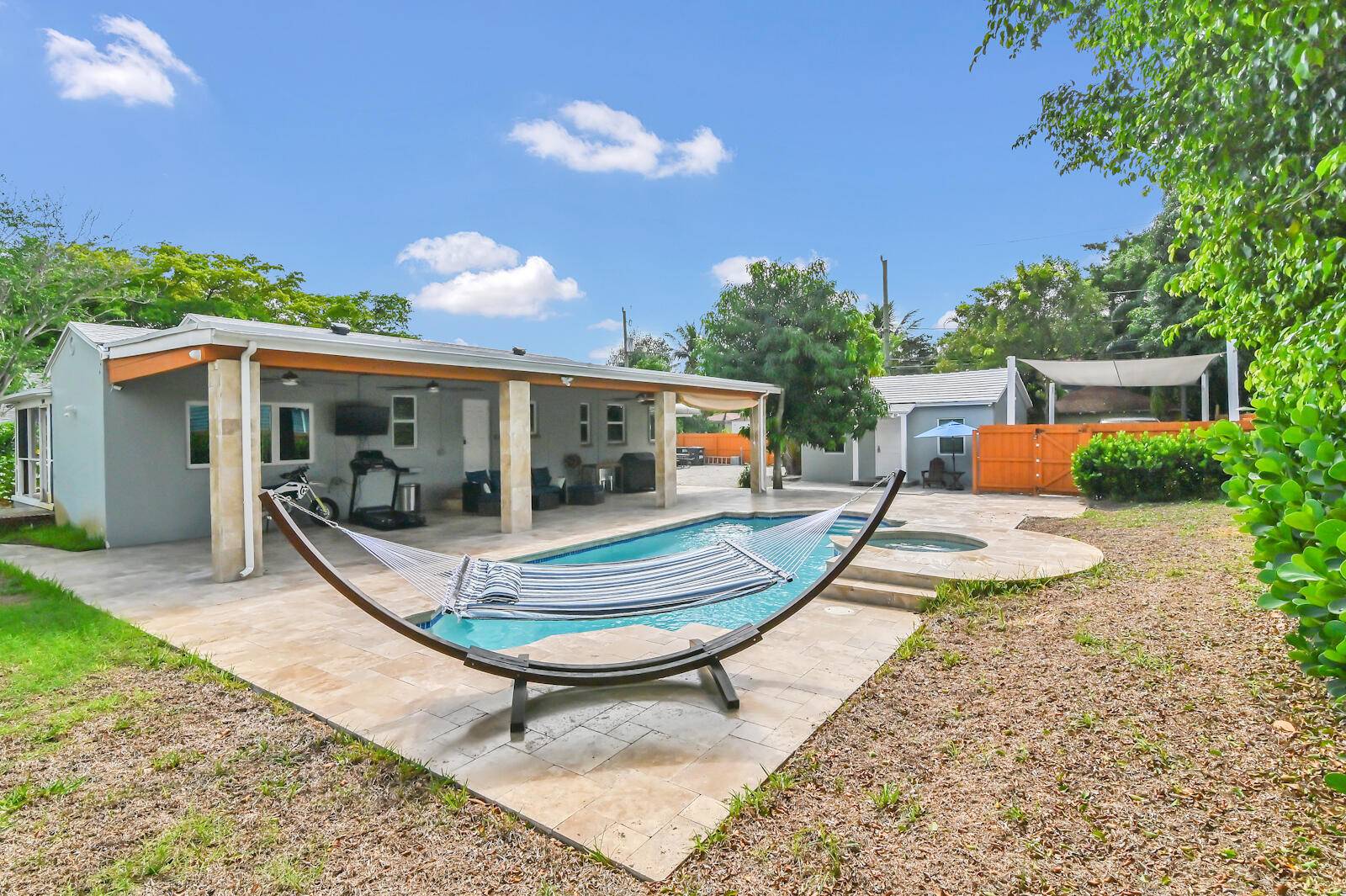 Fully upgraded home with guest house pool in the non HOA community of NORTHWOOD.