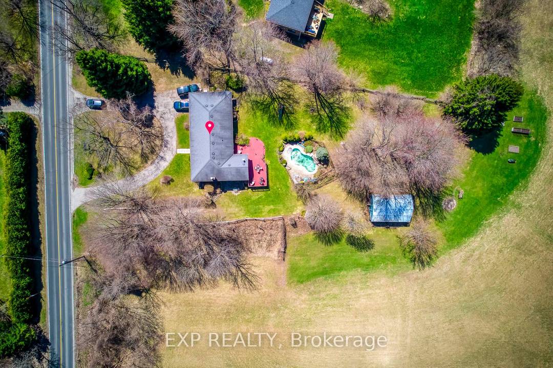 10 acre lot including a detached house for sale, just minutes from town.