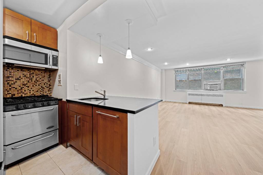 ALCOVE studio that easily fits a KING BED.