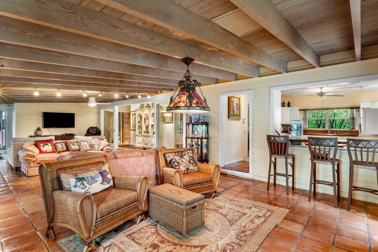 Unleash your creativity and reimagine the potential of this charming Bermuda home nestled on the Northend of Palm Beach.