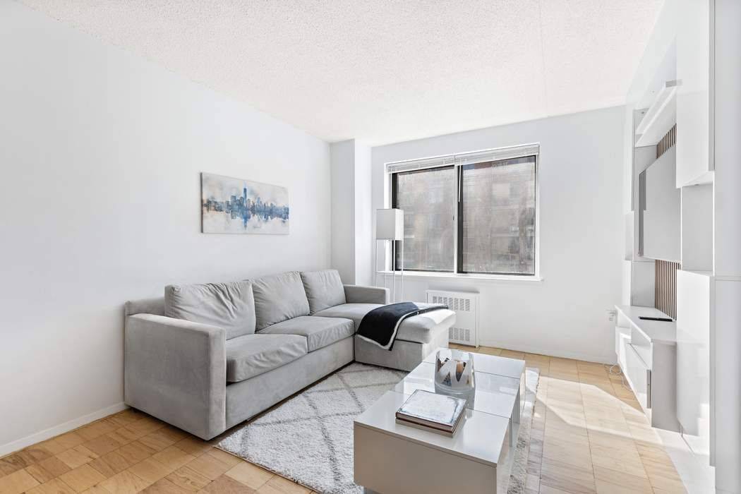 Nestled in the heart of Battery Park City, this spacious, fully furnished, alcove studio offers a seamless blend of comfort and functionality.