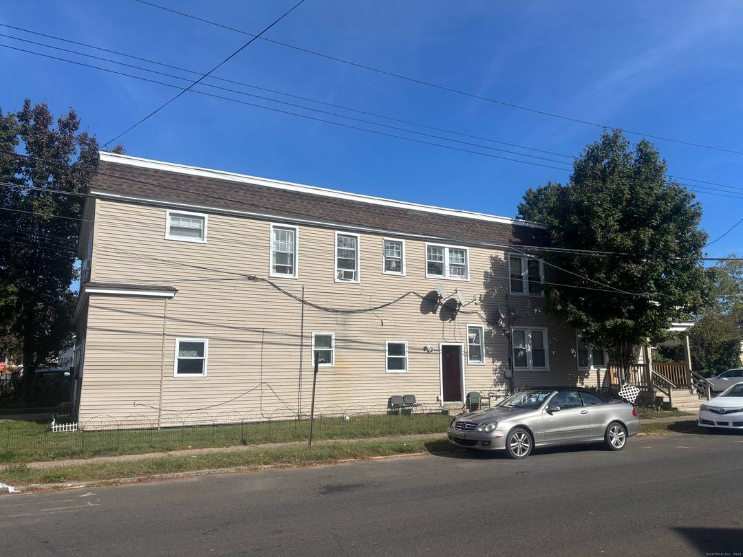 Welcome to 28 Brown Street a rare, oversized 4 family investment property in the heart of West Haven.