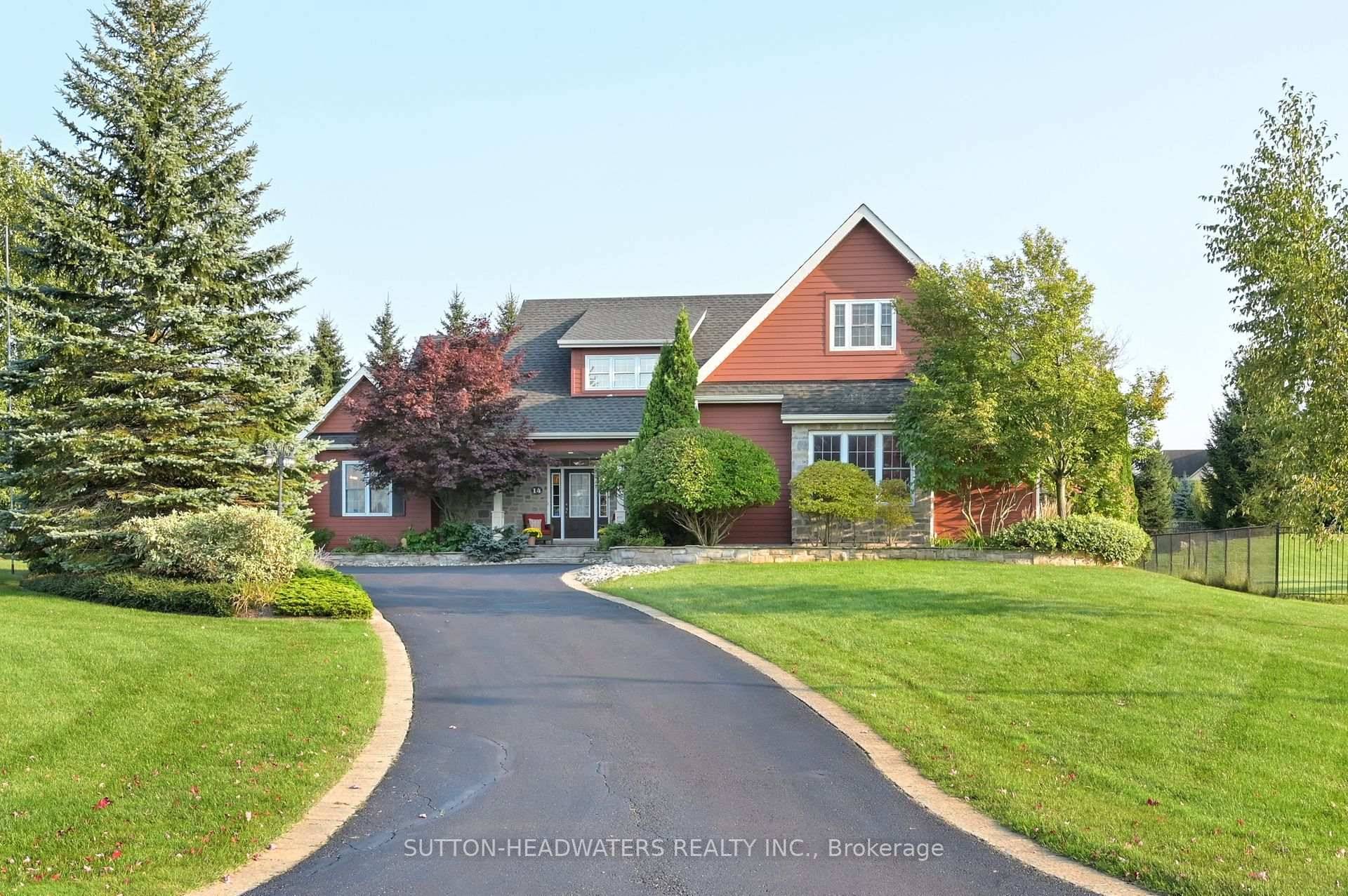 Nestled in exclusive Island Lake Estates, this meticulously maintained 3 bedroom bungalow blends natural beauty with luxurious living.