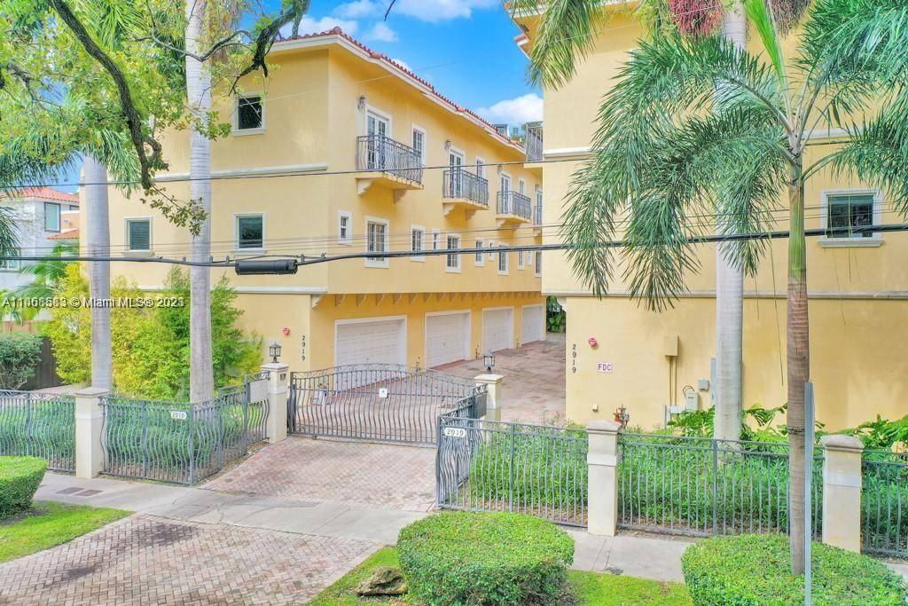 Beautiful New corner Unit Tri level Townhouse in a gated community in the Heart of Coconut Grove, 2 car garage.