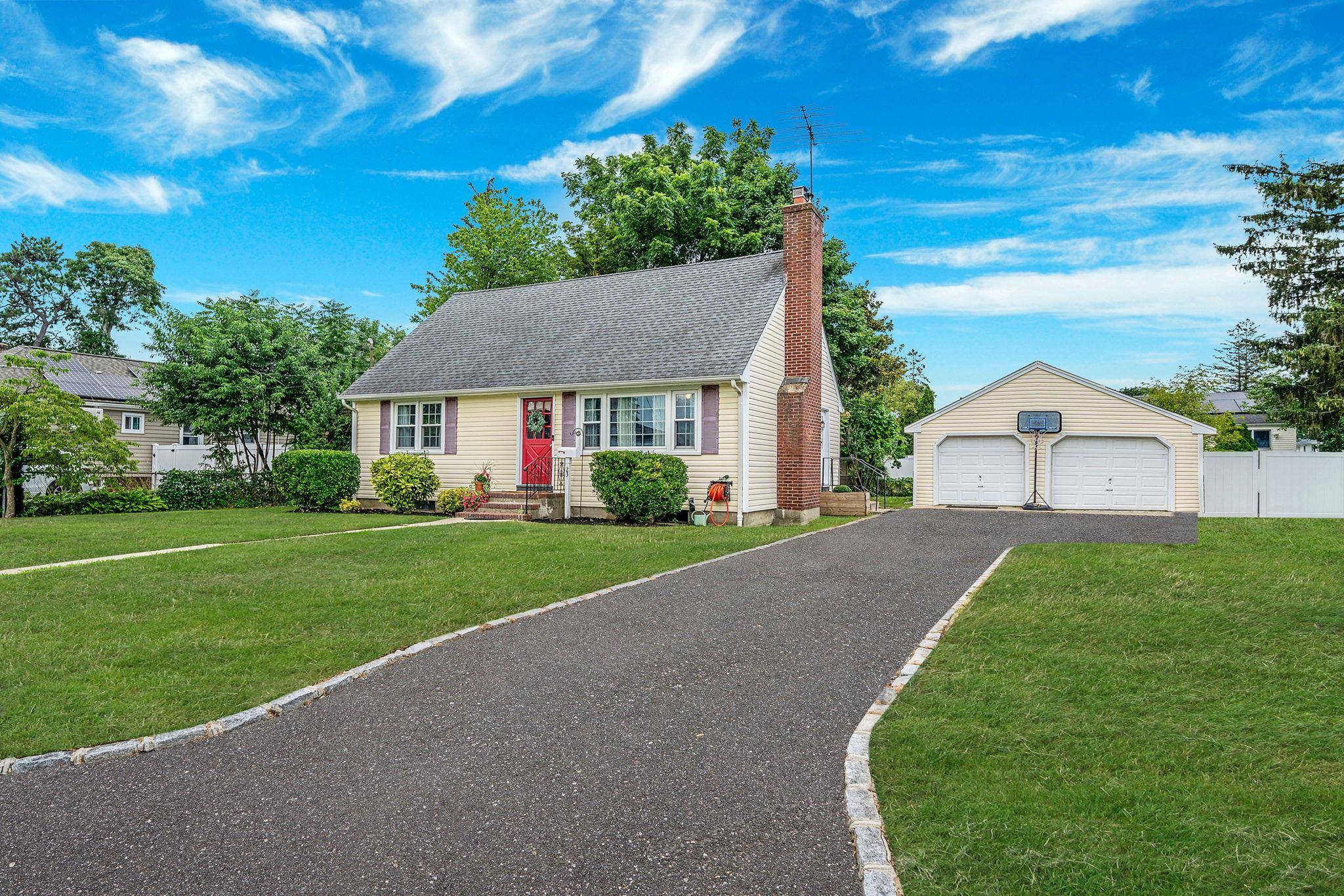 Spacious Cape Style Home with Great Potential !
