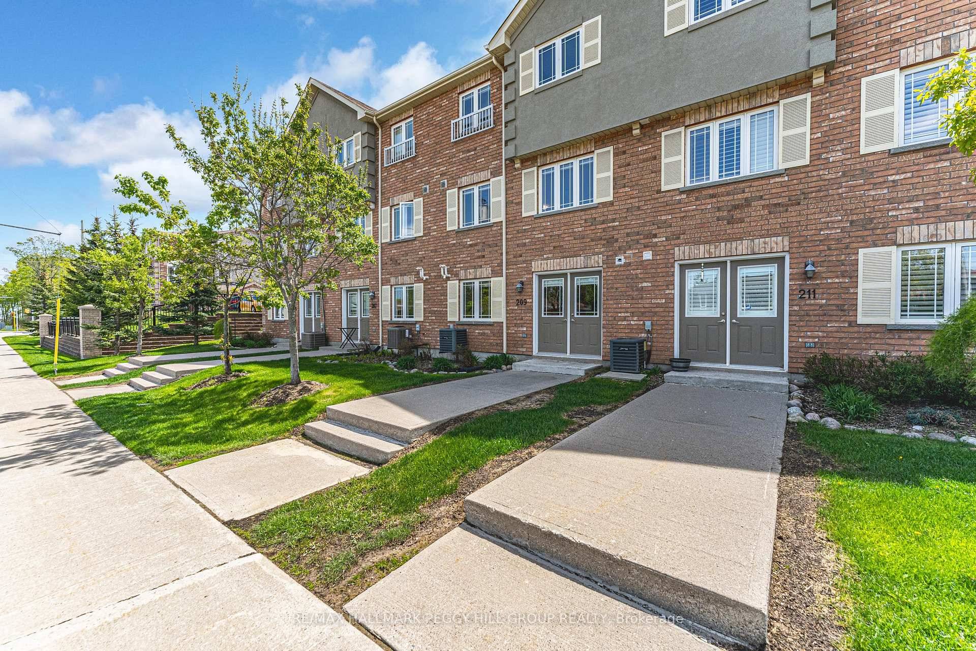 WELL APPOINTED TOWNHOME WITH A WALKOUT BASEMENT IN THE HEART OF HOLLY !