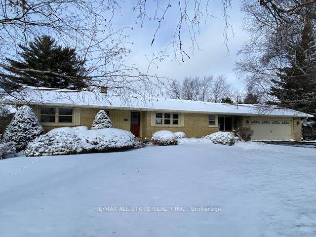 Truly a rare find ! This 3 1 bedroom all brick one owner home, custom built in 1958, is nestled on an exceptionally large, private maturely treed in town lot.
