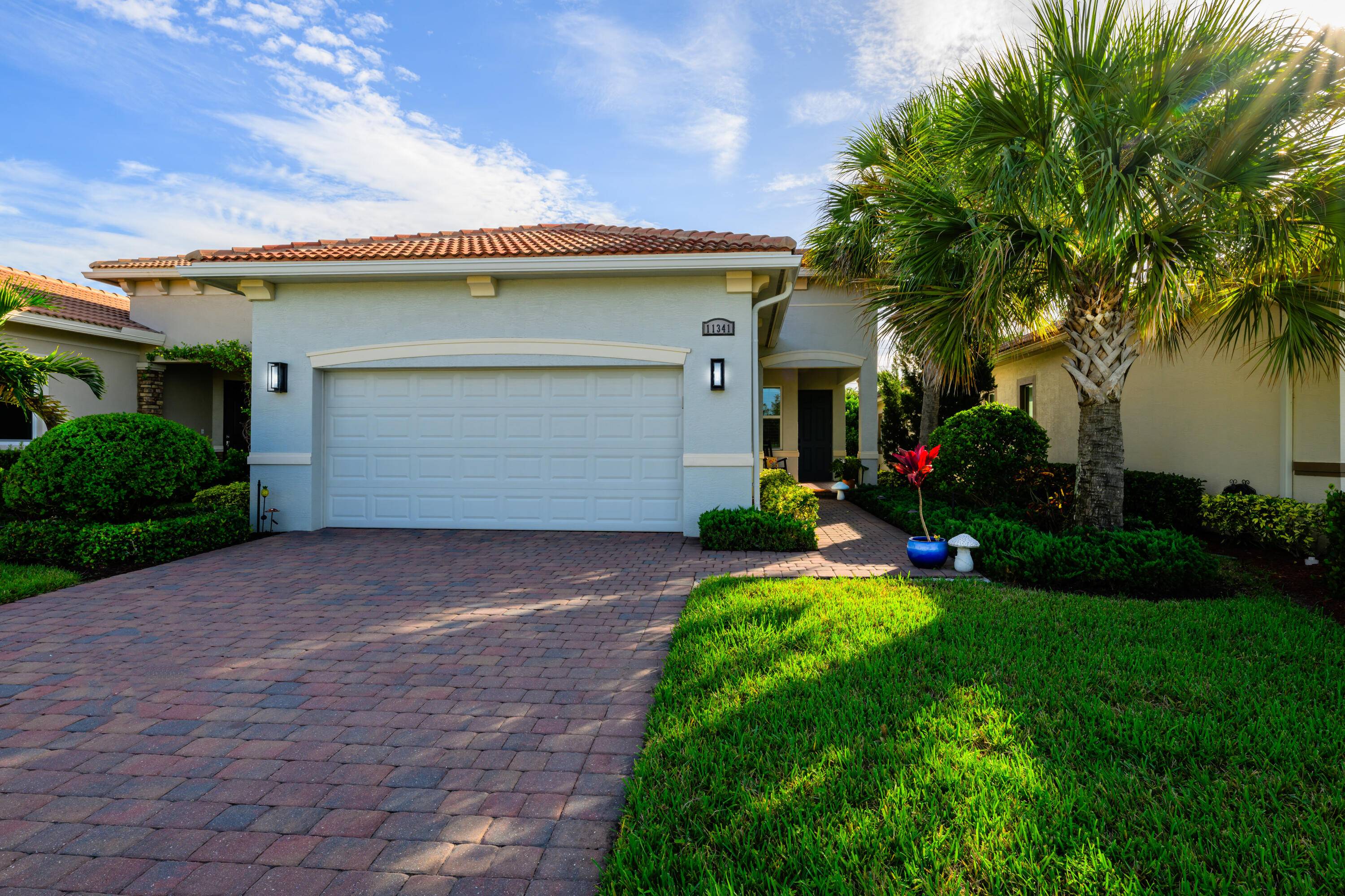 Welcome to 11341 SW Visconti Way, a stunning Arezzo model villa in the prestigious PGA Verano community of Port Saint Lucie.