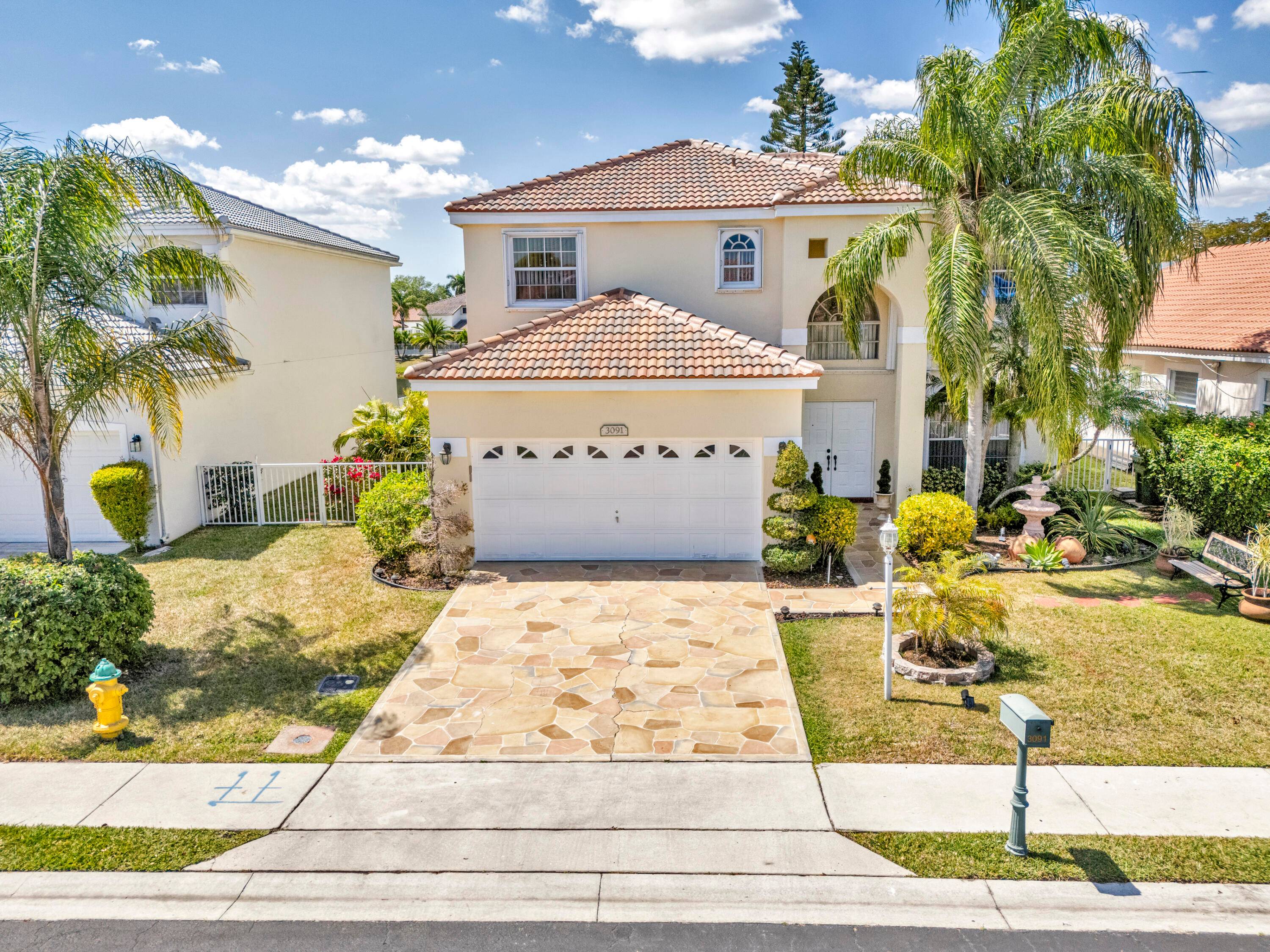 Beautifully Maintained Waterfront Home with 2024 Roof and Fresh Exterior Paint !