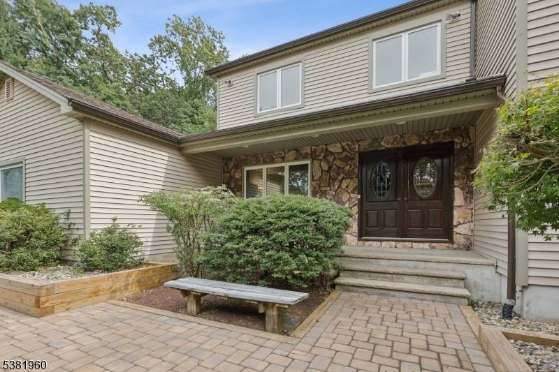 Tucked away on a quiet cul de sac in a desirable location, this beautiful home invites you in with open, sunlit rooms and versatile spaces for living and entertaining.