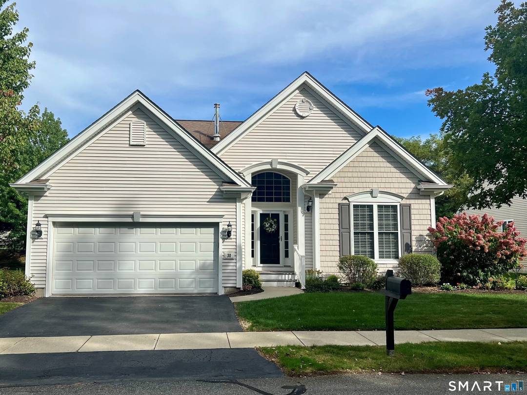 Tucked away in a serene, wooded setting within the coveted Cheshire Crossing II neighborhood, open to all ages, this exquisite single family detached home harmonizes sophistication and comfort.
