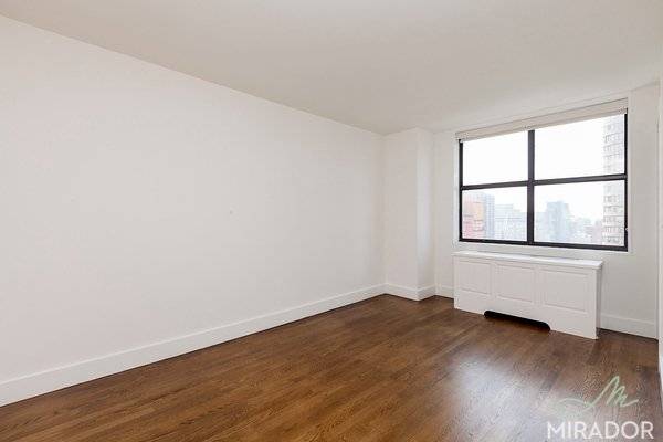 High floor one bedroom with balcony, hardwood floors, and renovated modern kitchen with stainless appliances now available at New York Tower.